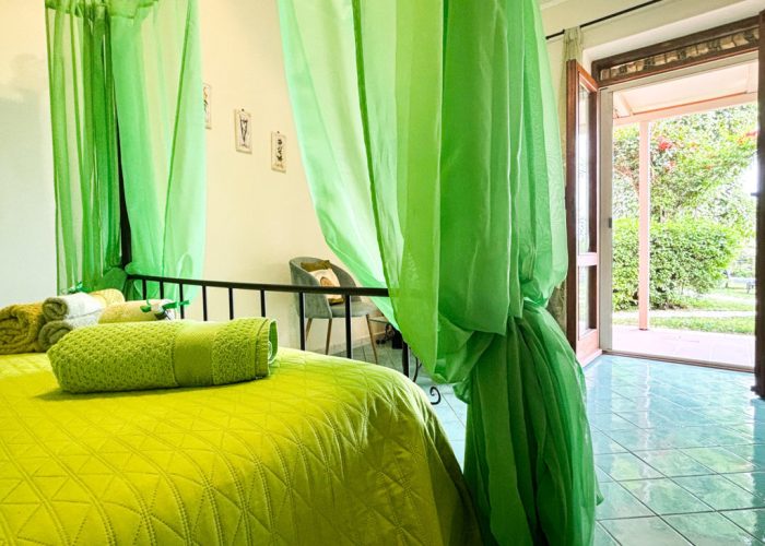 letto camera verde B&b Nefer Maratea
