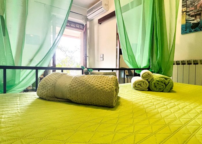 letto camera verde B&b Nefer Maratea